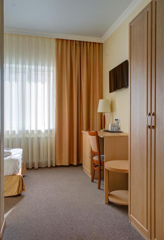 Torgay Hotel Astana Quarto foto