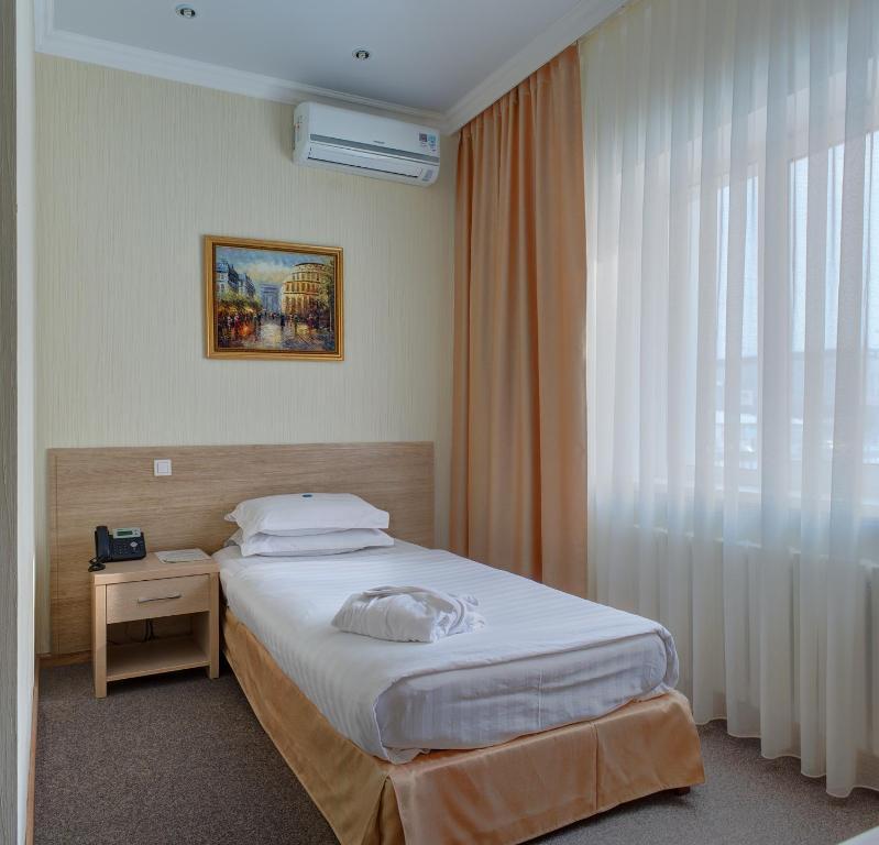 Torgay Hotel Astana Quarto foto